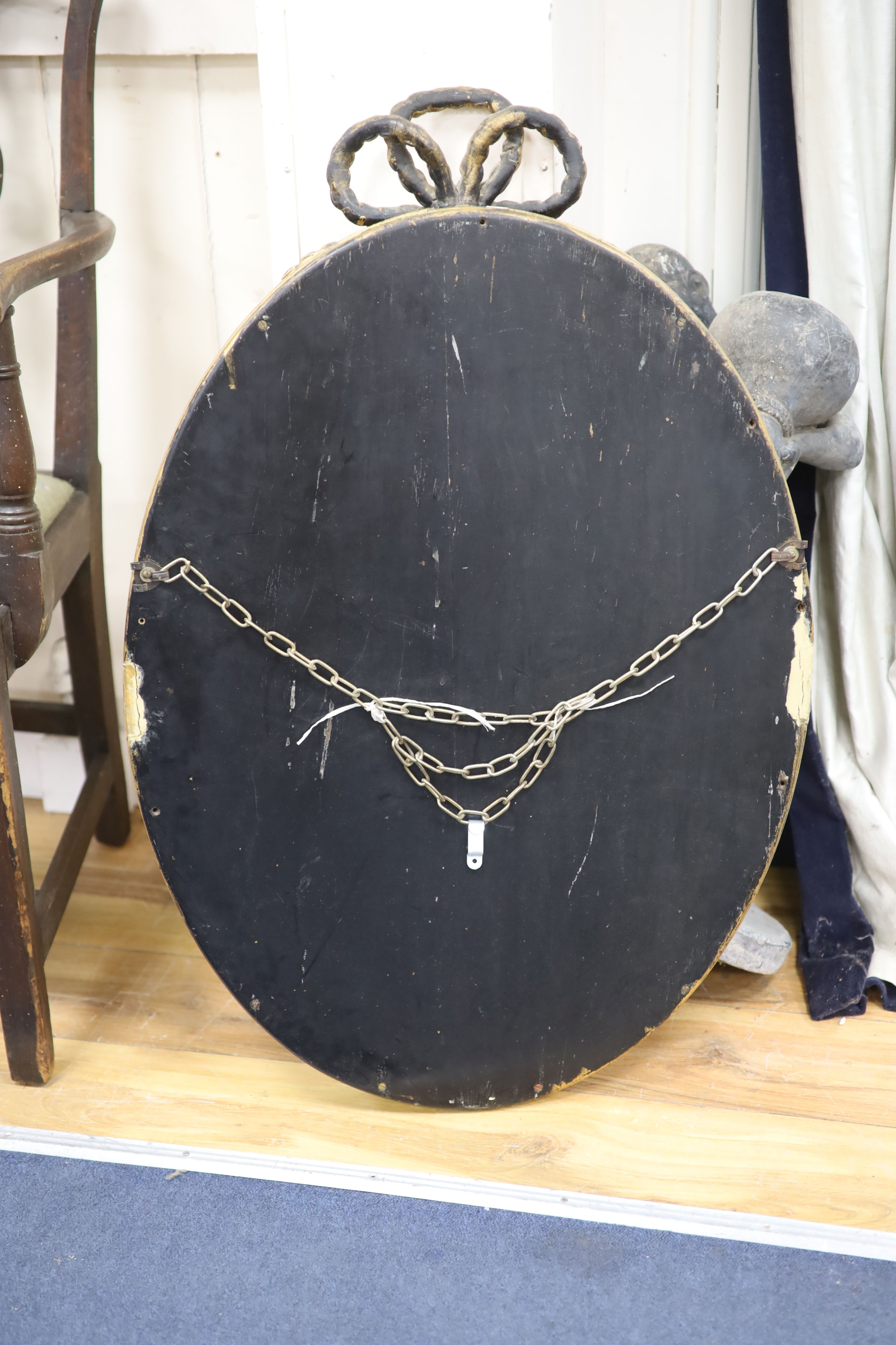 A gilt and composite wall mirror with simulated rope twist frame, width 56cm, height 84cm